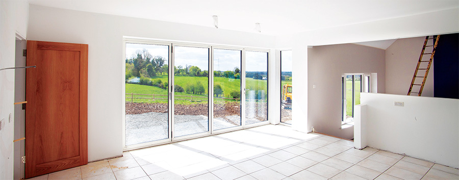 Reynaer’s aluminium bi-fold doors, triple-glazed with argon filling and an overall U-value of 1.0 W/m2K