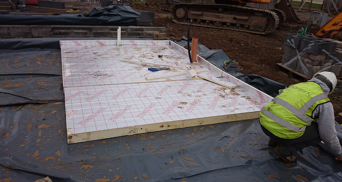 The ground floor features 150mm of Xtratherm insulation under the concrete slab and 100mm Xtratherm as an upstand to the inside of the blockwork around the entire perimeter to reduce thermal bridging.