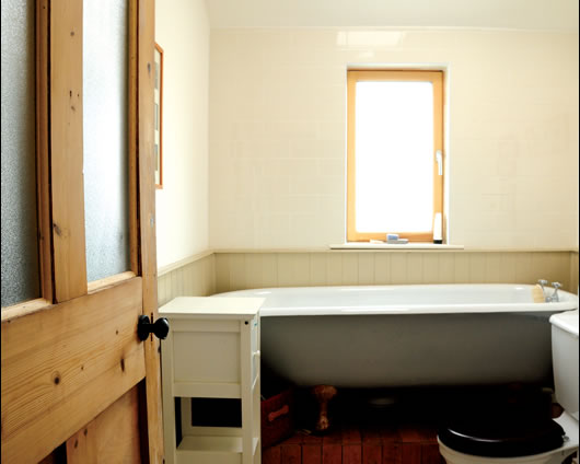 Salvaged materials includes doors, bath and toilet