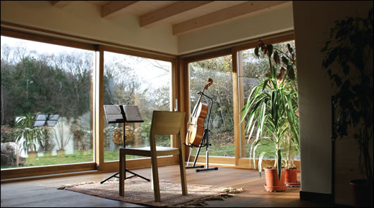 the music room faces south-west to maximise passive solar energy gain