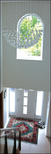 A double height entrance hall reduces the electrical lighting requirement