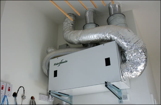 A heat recovery ventilation unit contributes to space heating but most heat is supplied by the Oschner air-source heat pump